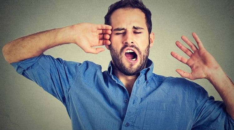 ५. जांभई देणे